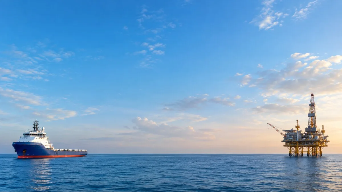 Offshore oil platform and engineering vessels at sea